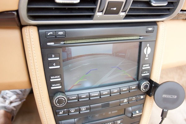 Backup camera view displayed on PCM screen with guidelines